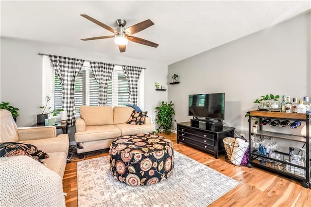 7041 Garnett St, Shawnee, KS 66203 - living room with ceiling fan and wood finished floors