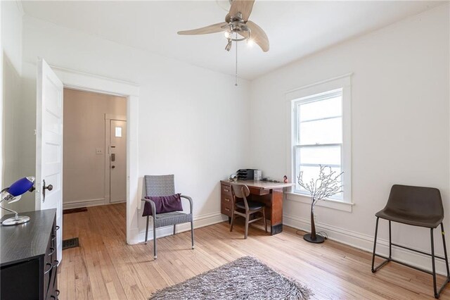 4231 Wyoming St, Kansas City, MO 64111 - office space featuring light wood-style floors, ceiling fan, and baseboards
