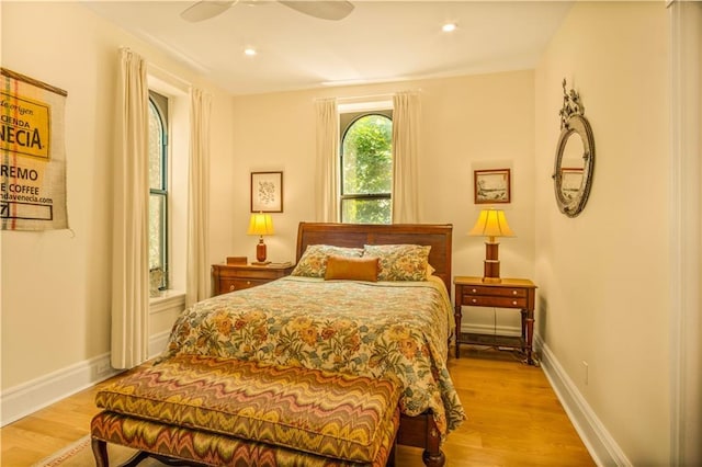 1633 Summit St, Kansas City, MO 64108 - bedroom featuring light wood-type flooring, baseboards, recessed lighting, and a ceiling fan