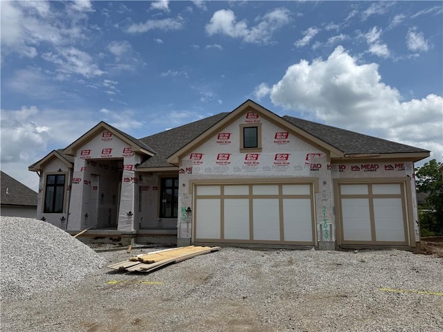 21603 W 80th Ter, Shawnee, KS 66220 - property in mid-construction with a shingled roof, an attached garage, and driveway