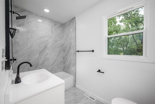 23852 Haigwood Rd, Tonganoxie, KS 66086 - full bath with marble look tile flooring, baseboards, toilet, vanity, and shower / bath combination