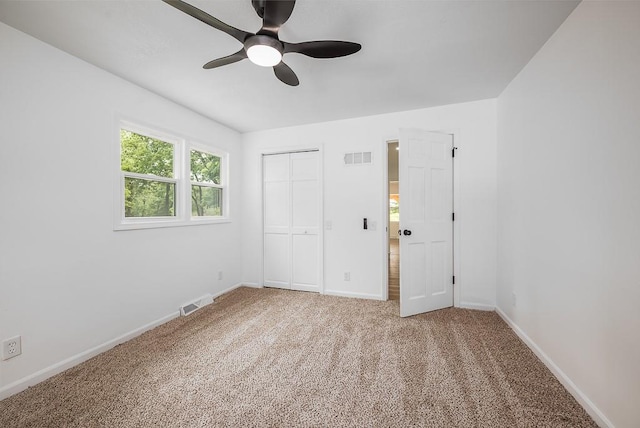 23852 Haigwood Rd, Tonganoxie, KS 66086 - unfurnished bedroom with carpet floors, baseboards, and a closet