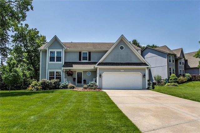 14169 W 115th Ter, Olathe, KS 66062 - traditional-style house featuring an attached garage, a front yard, and driveway