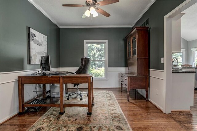 14169 W 115th Ter, Olathe, KS 66062 - home office with ceiling fan, plenty of natural light, wood finished floors, a wainscoted wall, and ornamental molding