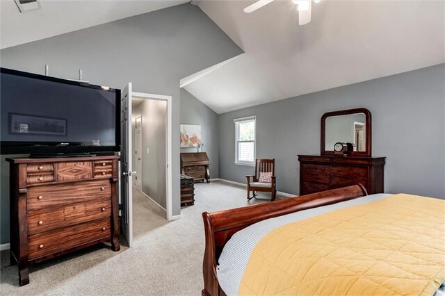 14169 W 115th Ter, Olathe, KS 66062 - bedroom featuring lofted ceiling, light carpet, and ceiling fan