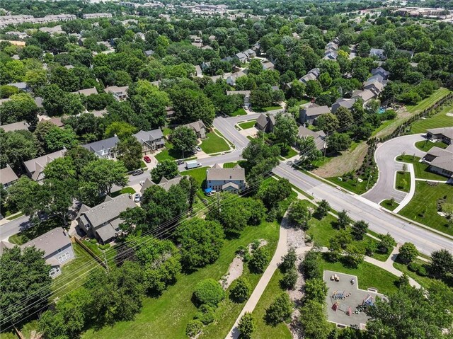 14169 W 115th Ter, Olathe, KS 66062 - aerial view of residential area with a tree filled landscape