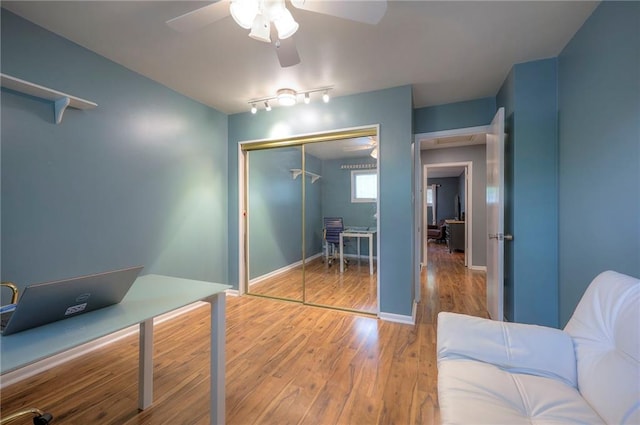 6520 W 51st St, Mission, KS 66202 - office area featuring ceiling fan, wood finished floors, and baseboards