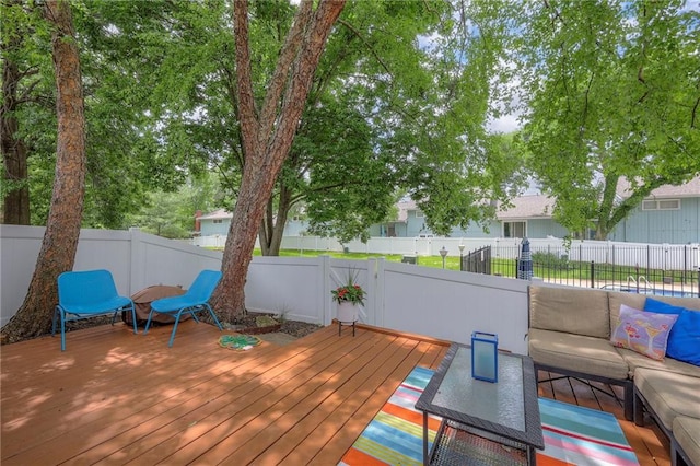 6520 W 51st St, Mission, KS 66202 - deck with outdoor lounge area and a fenced backyard