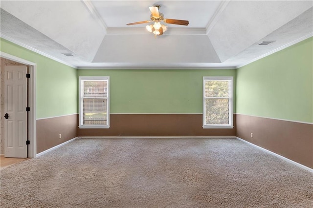 11207 W 109th St, Overland Park, KS 66210 - carpeted empty room with a tray ceiling, ceiling fan, ornamental molding, and baseboards