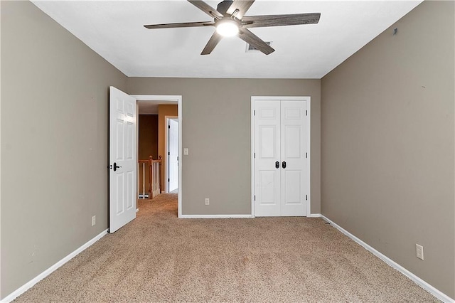11207 W 109th St, Overland Park, KS 66210 - unfurnished bedroom with carpet floors, baseboards, a closet, and ceiling fan