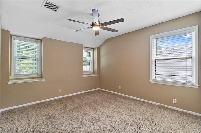11207 W 109th St, Overland Park, KS 66210 - spare room with ceiling fan, plenty of natural light, baseboards, carpet floors, and vaulted ceiling