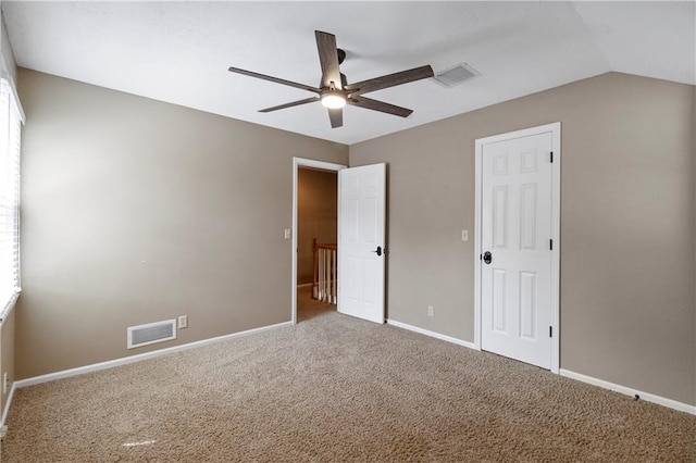 11207 W 109th St, Overland Park, KS 66210 - unfurnished bedroom featuring carpet floors, baseboards, and ceiling fan