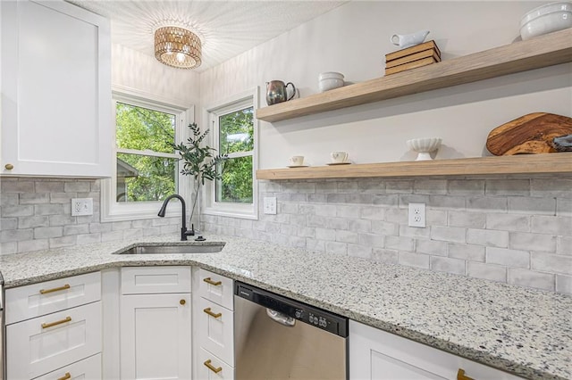 1345 NE Foxwood Dr, Lees Summit, MO 64086 - kitchen featuring open shelves, dishwasher, a sink, and white cabinetry