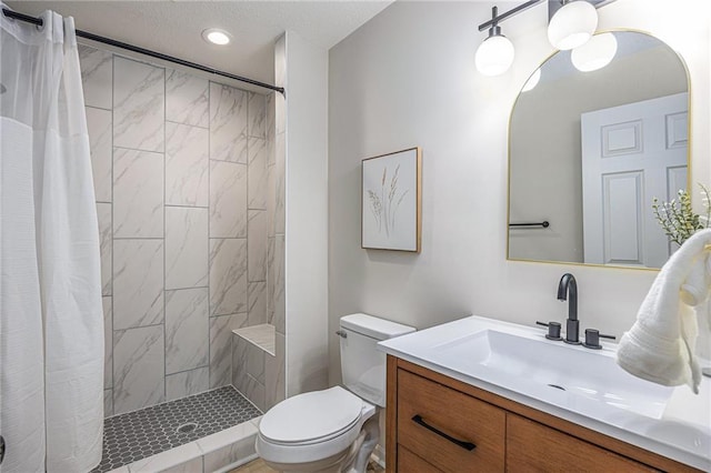 1345 NE Foxwood Dr, Lees Summit, MO 64086 - full bathroom with toilet, vanity, tiled shower, and recessed lighting