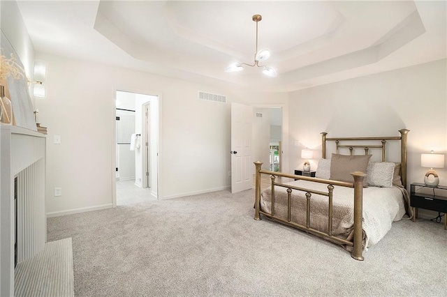 1345 NE Foxwood Dr, Lees Summit, MO 64086 - bedroom with a raised ceiling and carpet