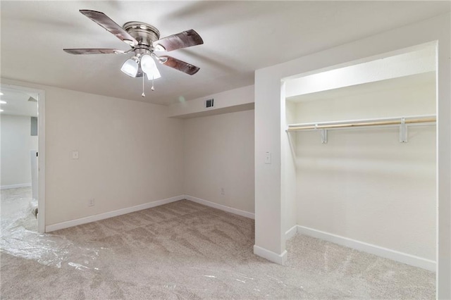 6201 N Topping Ave, Kansas City, MO 64119 - unfurnished bedroom with carpet floors, baseboards, a closet, and ceiling fan