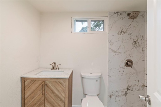 6201 N Topping Ave, Kansas City, MO 64119 - bathroom featuring a shower, toilet, and vanity