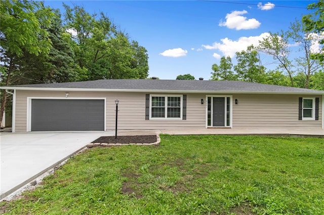 6201 N Topping Ave, Kansas City, MO 64119 - ranch-style home with driveway, a garage, and a front yard