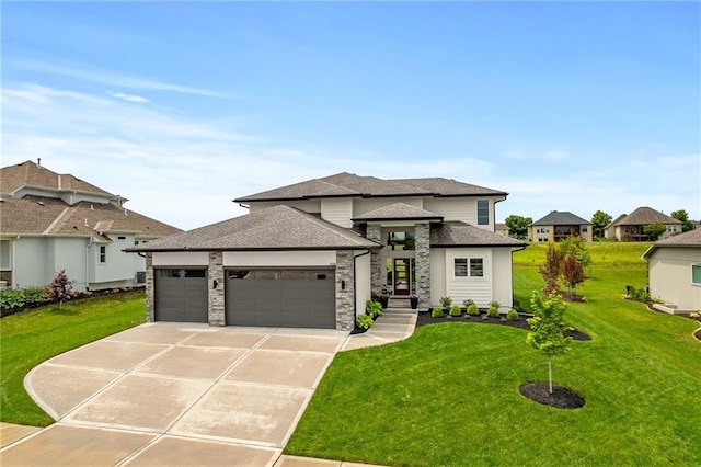 1120 Hillswick Ln, Raymore, MO 64083 - prairie-style home with a garage, a front yard, driveway, and roof with shingles