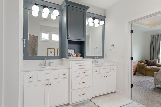 1120 Hillswick Ln, Raymore, MO 64083 - full bath with double vanity and connected bathroom