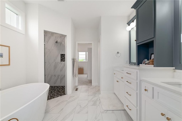 1120 Hillswick Ln, Raymore, MO 64083 - full bath with a soaking tub, vanity, a tile shower, and marble finish floors