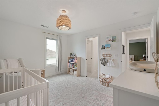 1120 Hillswick Ln, Raymore, MO 64083 - bedroom with a sink, light carpet, and baseboards