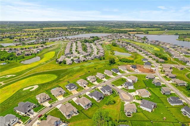 1120 Hillswick Ln, Raymore, MO 64083 - aerial perspective of suburban area featuring a nearby body of water and a golf course