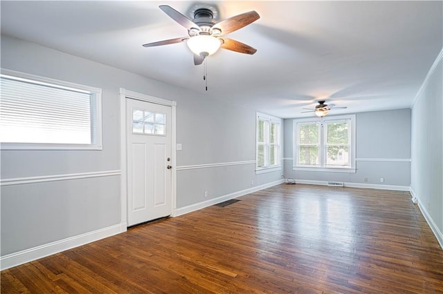 502 Vine St, Leavenworth, KS 66048 - entryway with ceiling fan, dark wood finished floors, and baseboards