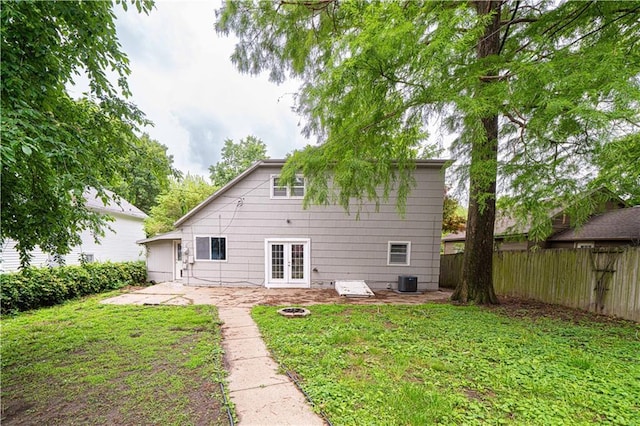 502 Vine St, Leavenworth, KS 66048 - back of house featuring a patio area, cooling unit, and french doors