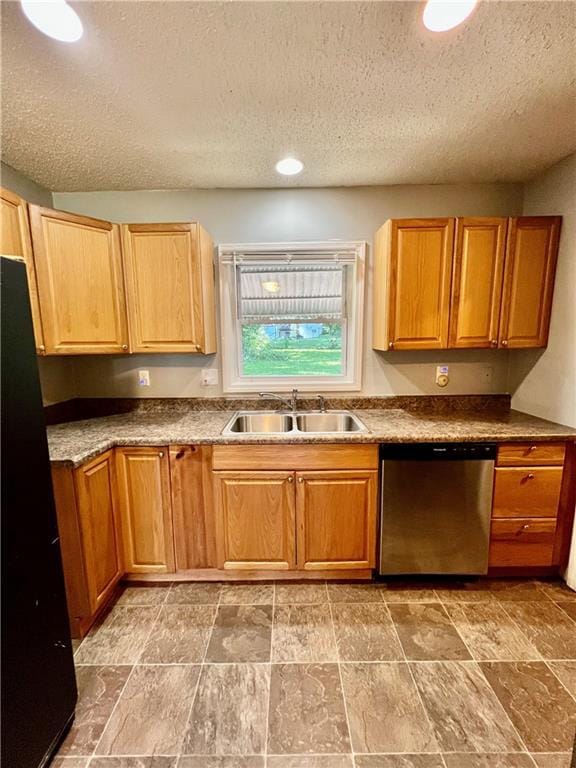 1208 E 80th St, Kansas City, MO 64131 - kitchen featuring dishwasher, a sink, a textured ceiling, and freestanding refrigerator