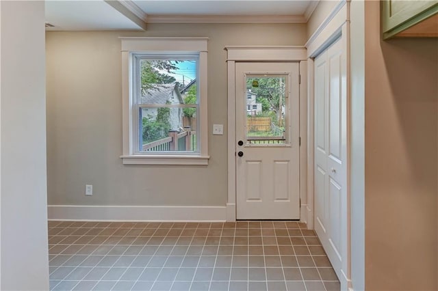 302 N Brighton Ave, Kansas City, MO 64123 - entryway with baseboards, tile patterned flooring, and crown molding