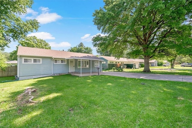 10720 Sycamore Ter, Kansas City, MO 64134 - ranch-style home featuring asphalt driveway