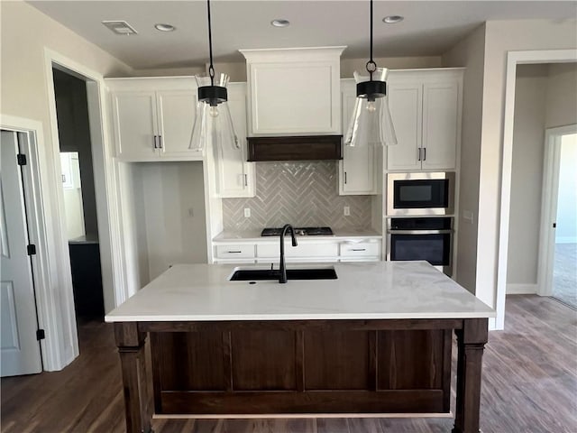 1516 SW Arborpark Ter, Lees Summit, MO 64082 - kitchen featuring appliances with stainless steel finishes, a sink, white cabinets, tasteful backsplash, and light countertops