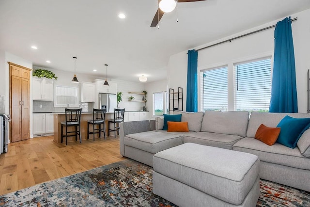 17756 Shady Bend Rd, Gardner, KS 66030 - living room with light wood-type flooring, ceiling fan, and recessed lighting
