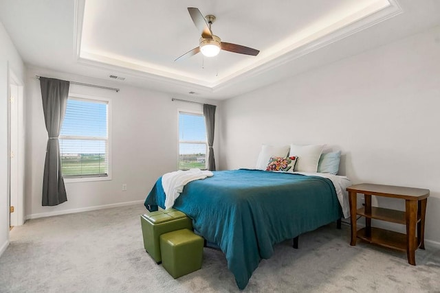 17756 Shady Bend Rd, Gardner, KS 66030 - carpeted bedroom featuring a raised ceiling, baseboards, and ceiling fan