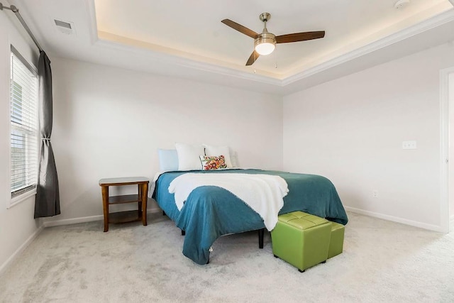 17756 Shady Bend Rd, Gardner, KS 66030 - carpeted bedroom featuring a tray ceiling, baseboards, and a ceiling fan