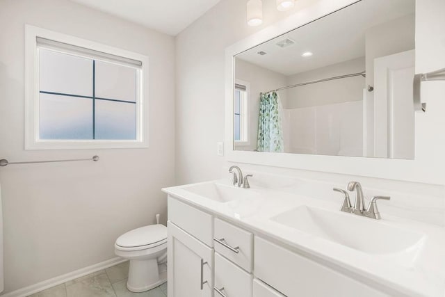 17756 Shady Bend Rd, Gardner, KS 66030 - full bath featuring marble finish flooring, double vanity, toilet, baseboards, and a shower with shower curtain