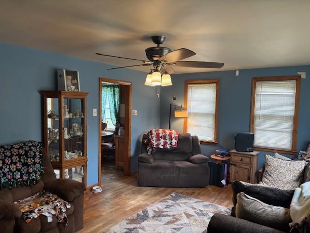 1119 Mound St, Atchison, KS 66002 - living room with ceiling fan and wood finished floors
