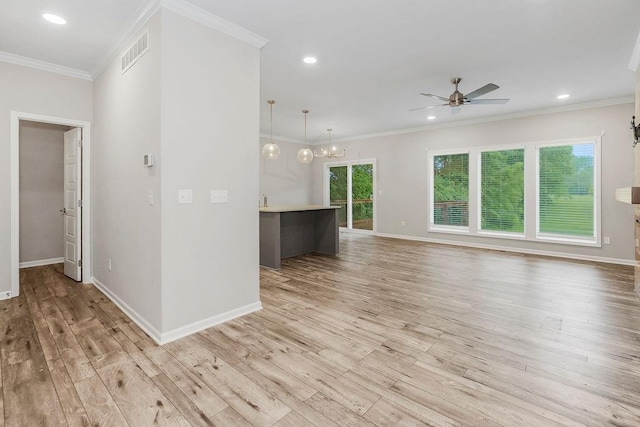 7515 Locust Dr, Kansas City, MO 64152 - unfurnished living room with ceiling fan, light wood finished floors, healthy amount of natural light, recessed lighting, and ornamental molding