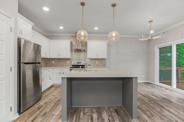 7515 Locust Dr, Kansas City, MO 64152 - kitchen featuring appliances with stainless steel finishes, wall chimney range hood, a sink, backsplash, and light wood-type flooring