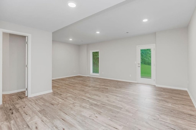 7515 Locust Dr, Kansas City, MO 64152 - empty room with light wood-style floors, recessed lighting, and baseboards