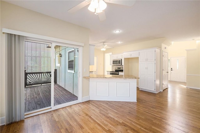 8901 W 128th St, Overland Park, KS 66213 - kitchen with a ceiling fan, appliances with stainless steel finishes, light wood-style flooring, and baseboards