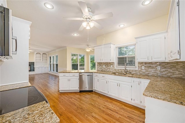 8901 W 128th St, Overland Park, KS 66213 - kitchen featuring dishwasher, a sink, ceiling fan, a peninsula, and light wood-type flooring