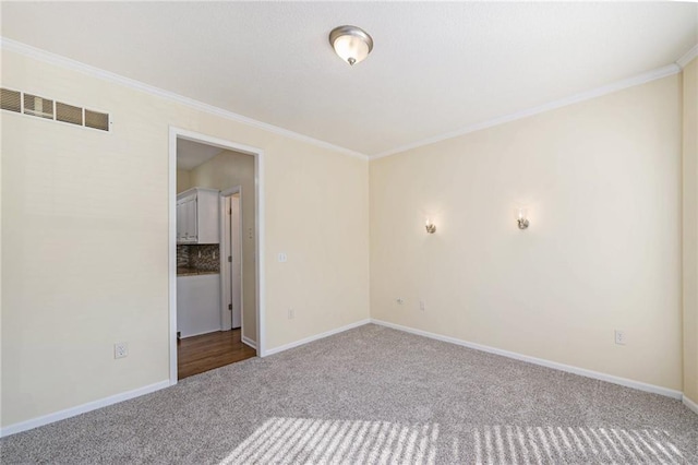 8901 W 128th St, Overland Park, KS 66213 - carpeted empty room with ornamental molding and baseboards