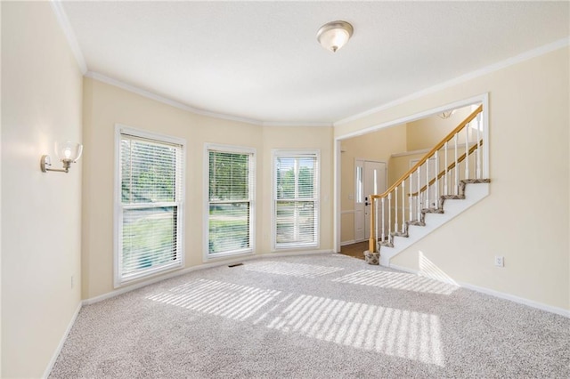 8901 W 128th St, Overland Park, KS 66213 - carpeted foyer featuring ornamental molding, plenty of natural light, stairway, and baseboards