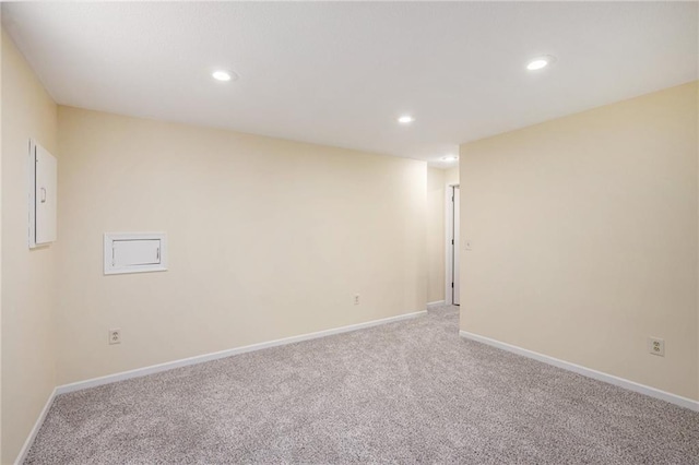 8901 W 128th St, Overland Park, KS 66213 - spare room featuring carpet floors, recessed lighting, and baseboards