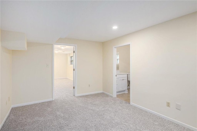 8901 W 128th St, Overland Park, KS 66213 - spare room with light carpet, baseboards, and recessed lighting