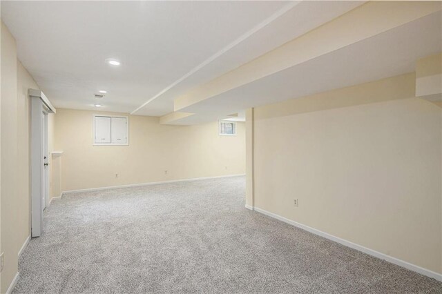 8901 W 128th St, Overland Park, KS 66213 - finished below grade area featuring carpet, baseboards, and recessed lighting