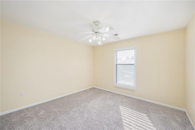 8901 W 128th St, Overland Park, KS 66213 - spare room with carpet flooring, baseboards, and a ceiling fan