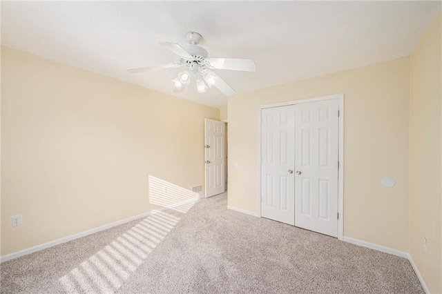 8901 W 128th St, Overland Park, KS 66213 - unfurnished bedroom featuring carpet, a closet, and baseboards